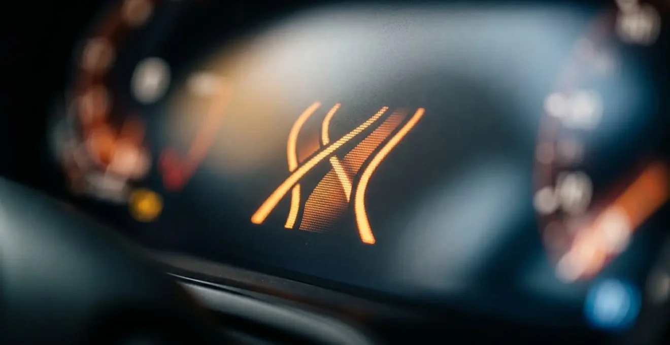Close-up macro view of driver assistance warning indicator showing lane departure alert detail
