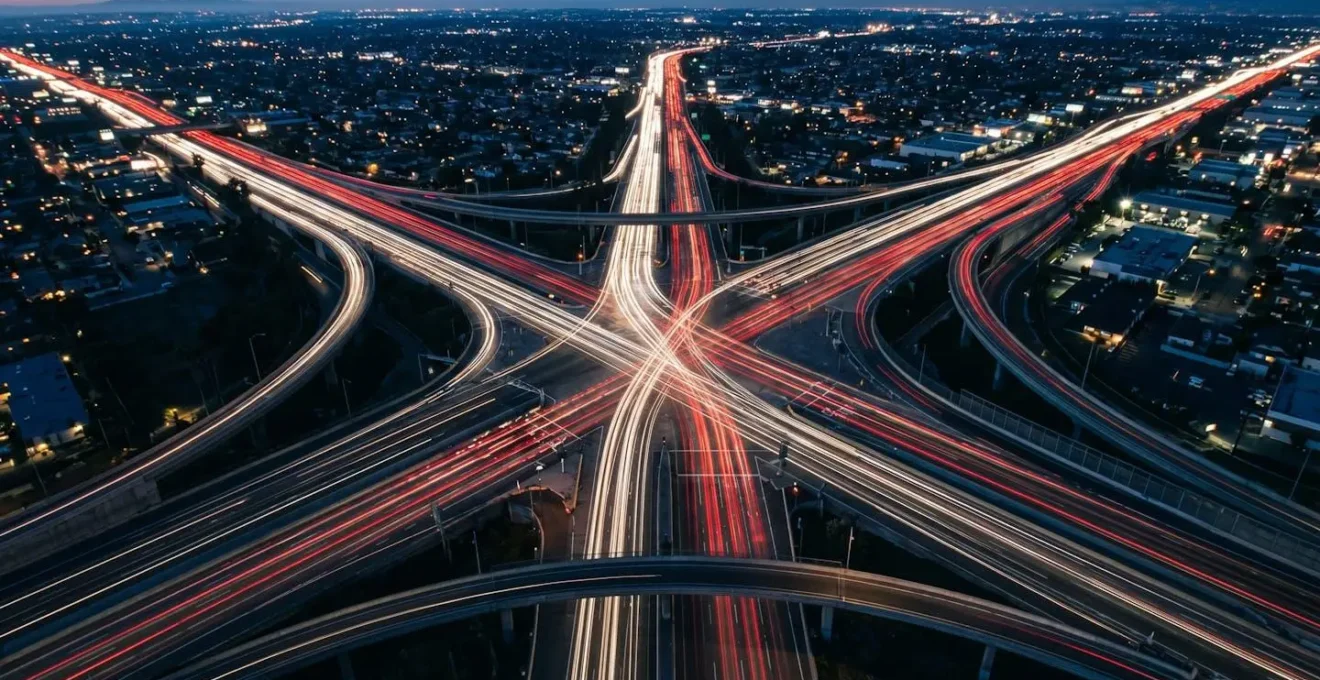 Abstract representation of interconnected vehicle data streams creating traffic pattern intelligence